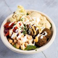 The Vegetarian's Dream Bowl · A dream for vegetarians! This bowl has homemade falafel pieces made from scratch with garban...