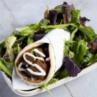 The Vegetarian's Gyro · A dream for vegetarians! This gyro has homemade falafel pieces made from scratch with garban...