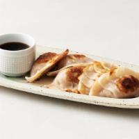 Veggie Gyoza · Five all-veggie filling wrapped into a thinly rolled piece of dough and pan seared until cri...