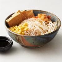 Fried Tofu Rice Bowl · White rice, fried tofu, vegan kimchi, corn, green onions and bean sprouts with a special veg...