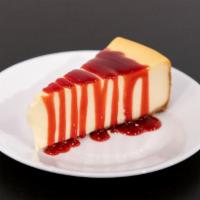 New York Style Cheesecake · A luscious, rich and sweet slice of New York style cheesecake.
