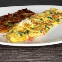 Mexican Omelette  · Jalapeños, Onions, Tomatoes And Oaxaca Cheese