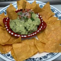 Guacamole and Chips · 8 oz. Avocado, onions, cilantro, jalapenos pepper, lime, and homemade corn chips.