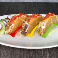 Order of Mixed Tacos in Hard Shell · Served with lettuce, tomato, cheese, and sour cream.