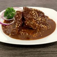 Mole Poblano · Mole it is a traditional marinade, a delicious blend of chile, chocolate, toasted seeds, and...