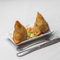 Samosa Meat · Crisp turnover filled with curried minced meat.