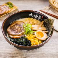 #2. Kyushu Tonkatsu Shio Ramen · Chashu pork, 1/2 marinated egg, bamboo shoots, corn, wakame, scallions and nori.
