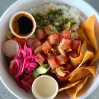 Poke Bowl · Raw marinated sushi #1 grade ahi tuna served with homemade chips, mixed salad and seasoned r...