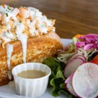 Lobster Grinder · Chilled lobster, crab, and shrimp packed into a warm split-top butter roll. Served with natu...