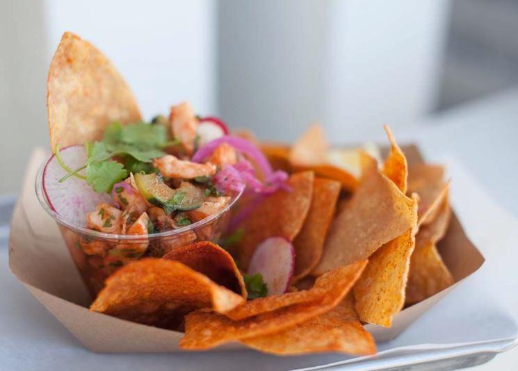 Shrimp Ceviche · Marinated shrimp, tomato, lime, cucumber, and tortilla chips. Gluten free.