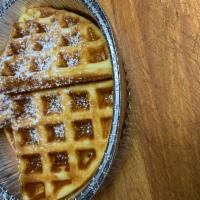 Danny's Belgian Waffle · Danny's Belgian Waffle is served as 4 quarters of an 8-inch waffle with butter and syrup.