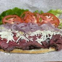 Danny's Hot/Cold Pastrami Sandwich · The Pastrami Sandwich is served with swiss cheese, lettuce, tomato, onions and comes in a ro...