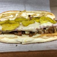 Danny's Cuban Sandwich · The Cuban Sandwich is served with roast pulled pork with ham, swiss cheese, mustard and pick...