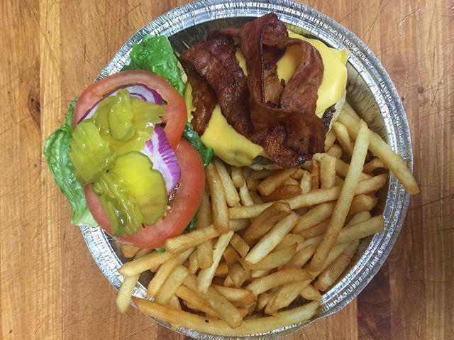Danny's Bacon Cheeseburger Deluxe · The Bacon Cheeseburger is served with romaine lettuce, tomatoes, bacon, onions, pickles, and a cheese selection of your choice.