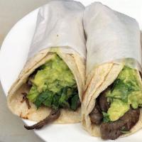 Danny's Taco with Guacamole 🌮  · Danny's Taco is served with your choice of (chicken, steak or pork), cilantro, guacamole & o...