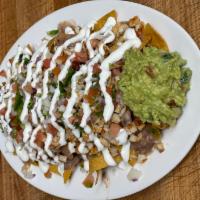 Danny's Nachos Platter · Our nachos are served with beans, cheese, pico de gallo and sour cream on top. You have the ...