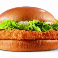 Alaskan Pacific Cod Fish Sandwich · Crispy Alaskan Pacific Cod, topped with lettuce and tarter sauce, on a toasted bun.