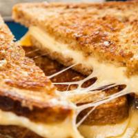 Grilled Cheese Sandwich · Serve on toasted butter slice breads with melted cheese.