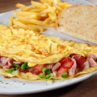 Cheese omelet with meat · 3 eggs omelete, choice of cheese, choice of meat with choice of toast and hashbrown 
