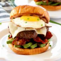 Brunch Burger · Fried eggs, hashbrown, bacon and choice of cheese.