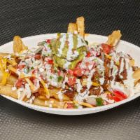 Carne Asada Fries · Choice of meat served with cheddar, cotija, salsa, creme and chipotle.