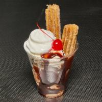Churro Sundae · Cinnamon, sugar, chocolate sauce, vanilla ice cream, whipped cream and cherries.