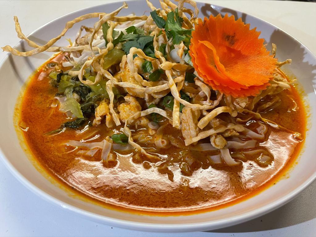 SN6. Thai Curry Noodles · Egg noodles, choice of chicken, pork, beef, tofu or seafood with bean sprout, onion, green onion,thai pickle in spicy red curry broth.