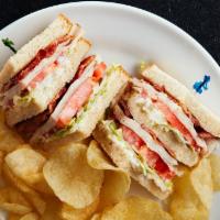 Turkey Club Sandwich · Turkey, bacon, lettuce, tomato, and mayo with choice of toast; served with homemade potato c...