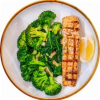 Grilled Salmon · Served with spinach, broccoli, and garlic and oil.