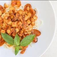 Linguine del Pescatore · Linguine, calamari, scallops, shrimp, clams and fresh spicy tomato sauce.