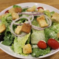 Caesar Salad · Crisp romaine, croutons, Romano cheese, tomato, kalamata olives and onion.