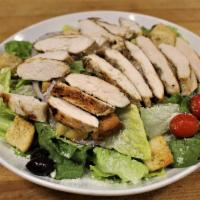 Caesar Salad with Chicken · Crisp romaine, croutons, Romano cheese, tomato, kalamata olives and onion combined with clas...