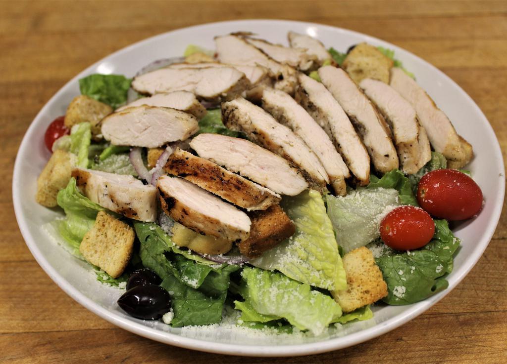 Caesar Salad with Chicken · Crisp romaine, croutons, Romano cheese, tomato, kalamata olives and onion combined with classic Caesar dressing.