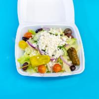 Greek Salad · Lettuce, tomatoes, cucumber, red onions, feta cheese, Kalamata olives, dolmades, and peppero...