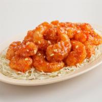 Chili Shrimp · Deep fried shrimp are served with sweet and spicy chili sauce peanut on top.