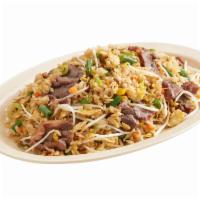 Beef Fried Rice · Beef fried rice served with assorted vegetables and fresh egg.