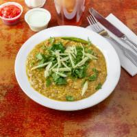 Haleem · Chicken, 4 types of lentils, wheat, fresh ginger and chili mixed and cooked on low heat.