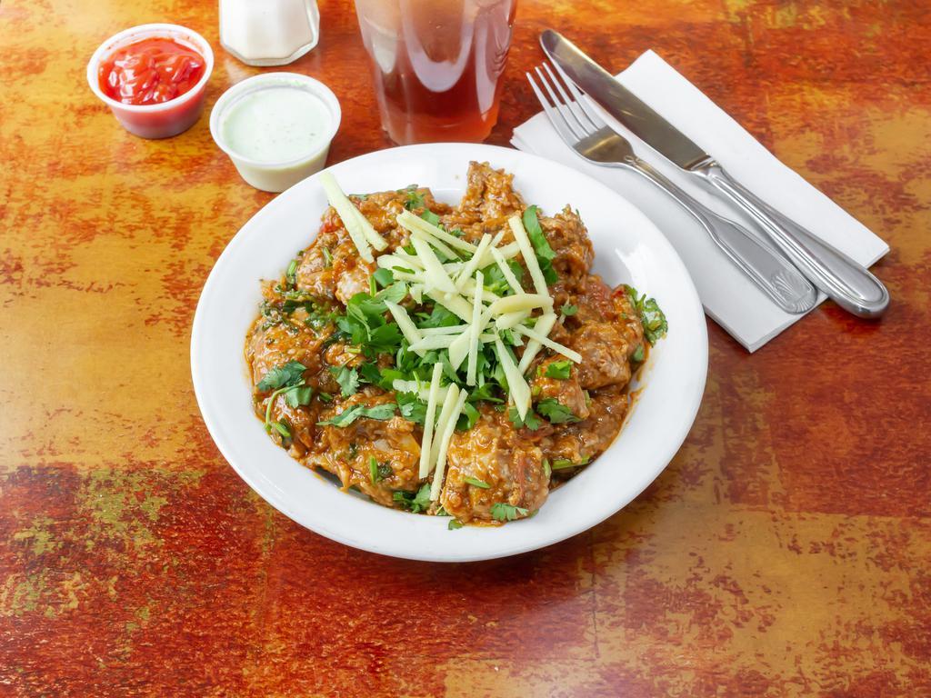 Chicken Karahi · Chicken pieces cooked with fresh tomatoes, green chilies, ginger, other spices and herbs.