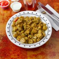 Bindi Masala · Fresh okra cooked with tomatoes, onions and peppers.