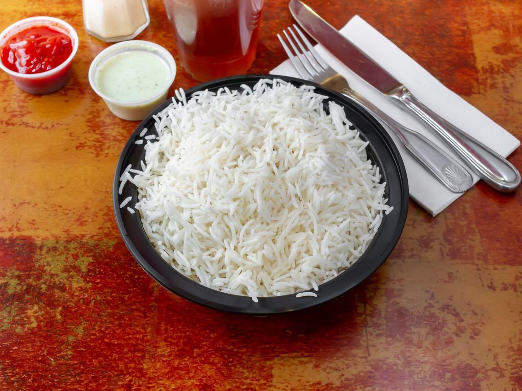 Steamed Rice · Plain white boiled rice.