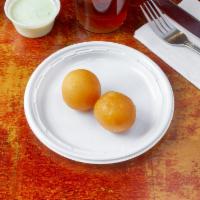 2 Piece Gulab Jamun · Balls of condensed milk in a sugary syrup.