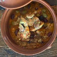 tagine de pollo · roasted chicken thighs*, cous cous, figs, olives, fall vegetables