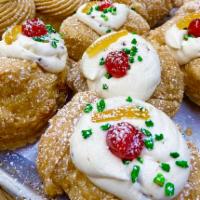 St. Joseph Cannoli Cream · Traditional pastries usually eaten on St. Joseph's day. Fried Zeppole filled with Cannoli cr...