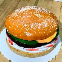 Hamburger Cake  · Vanilla & chocolate cake, filled with whipped cream & strawberries.
Medium serves 10-15 peop...