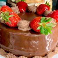 Strawberry & Banana Chocolate Ganache Cake  · Small- Vanilla cake filled with french cream, strawberry, and banana. Large- Chocolate cake ...