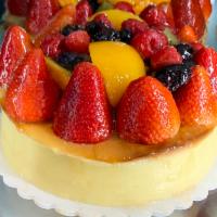 Mixed Berry Glazed Fruit Cheesecake  · Serves 10 people.