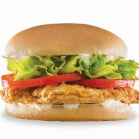 Dude Chicken Fried Steak · Classic chicken fried steak topped with crisp lettuce, ripe tomatoes, and salad dressing.