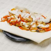 Grilled Chicken Lunch Wrap · Grilled chicken breast with fresh mozzarella, roasted peppers, tomatoes and dressing.