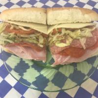 Italian Sub · Fresh ham, salami, and pepperoni topped with provolone, green peppers, sliced tomatoes, lett...