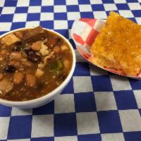 Cowboy Beans   · Pinto & Black beans, grilled chicken onion, green peppers, and our own medley of sauce and s...